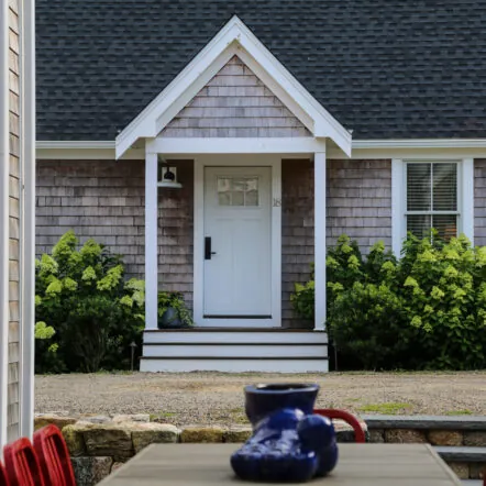 Outside Back cottage style with outdoor table and chairs